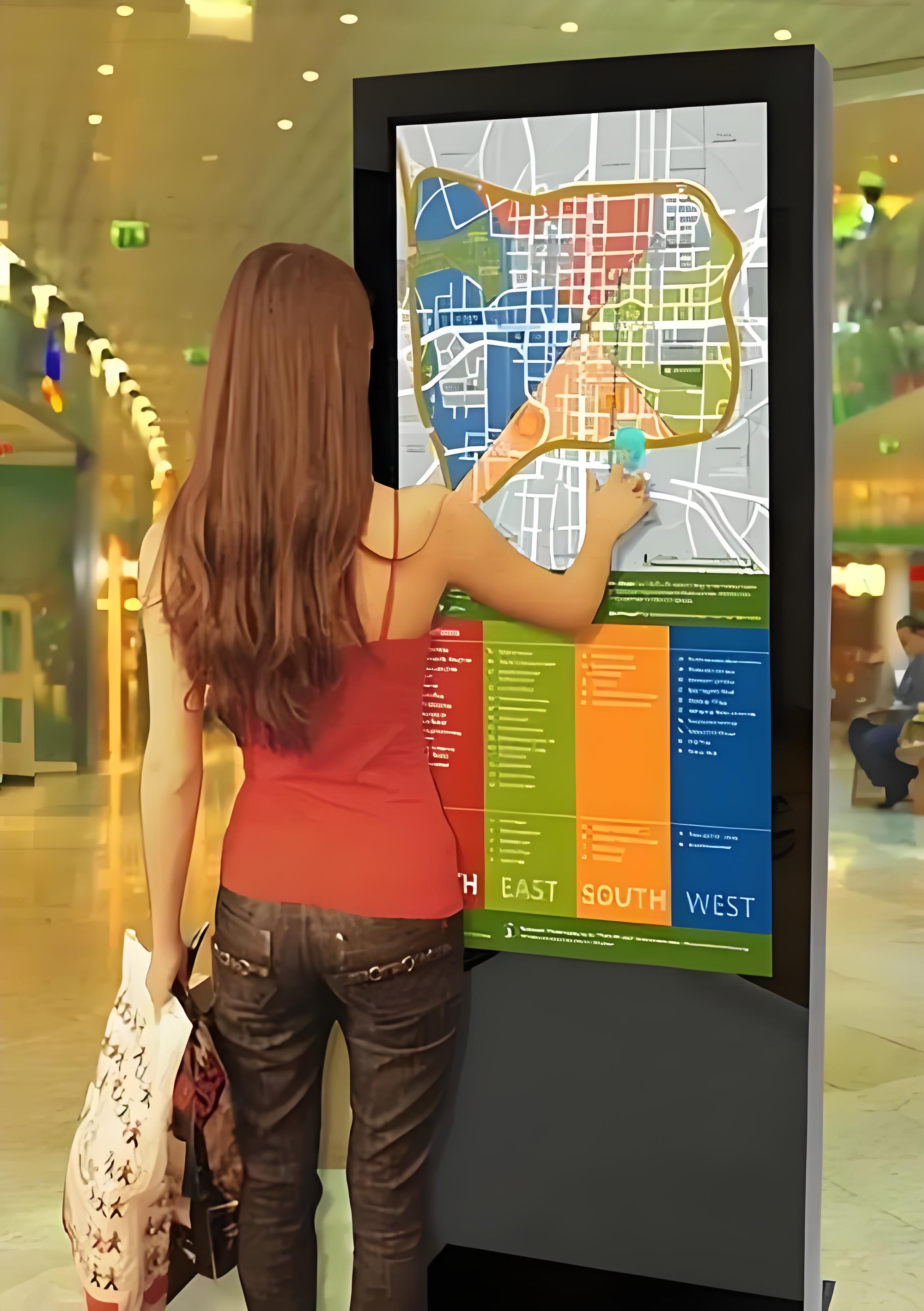 Team of professionals working on computers in modern office environment, collaborative workspace